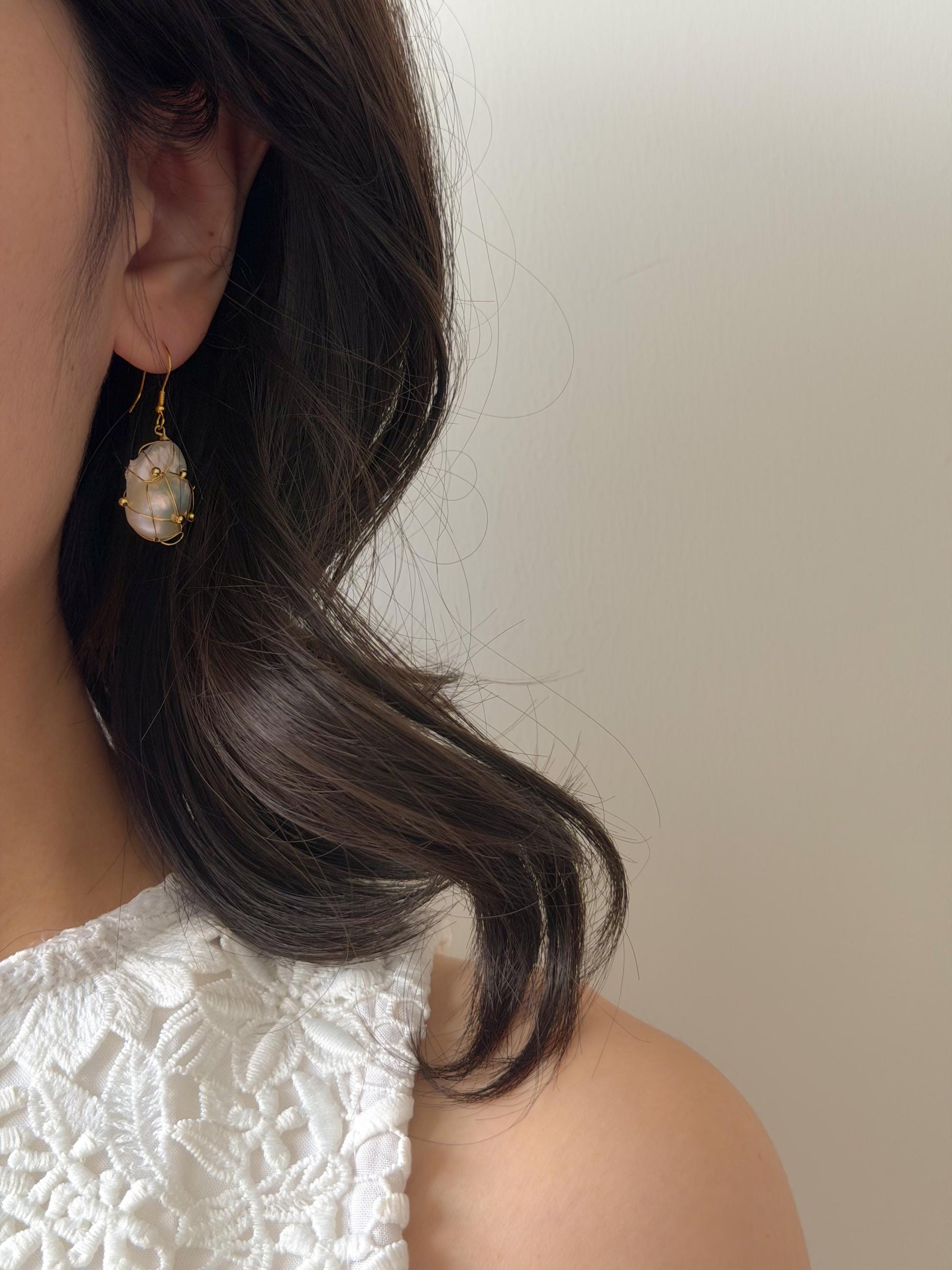 Additional view of wire wrapped baroque pearl drop earrings by Le Jardin Perles
