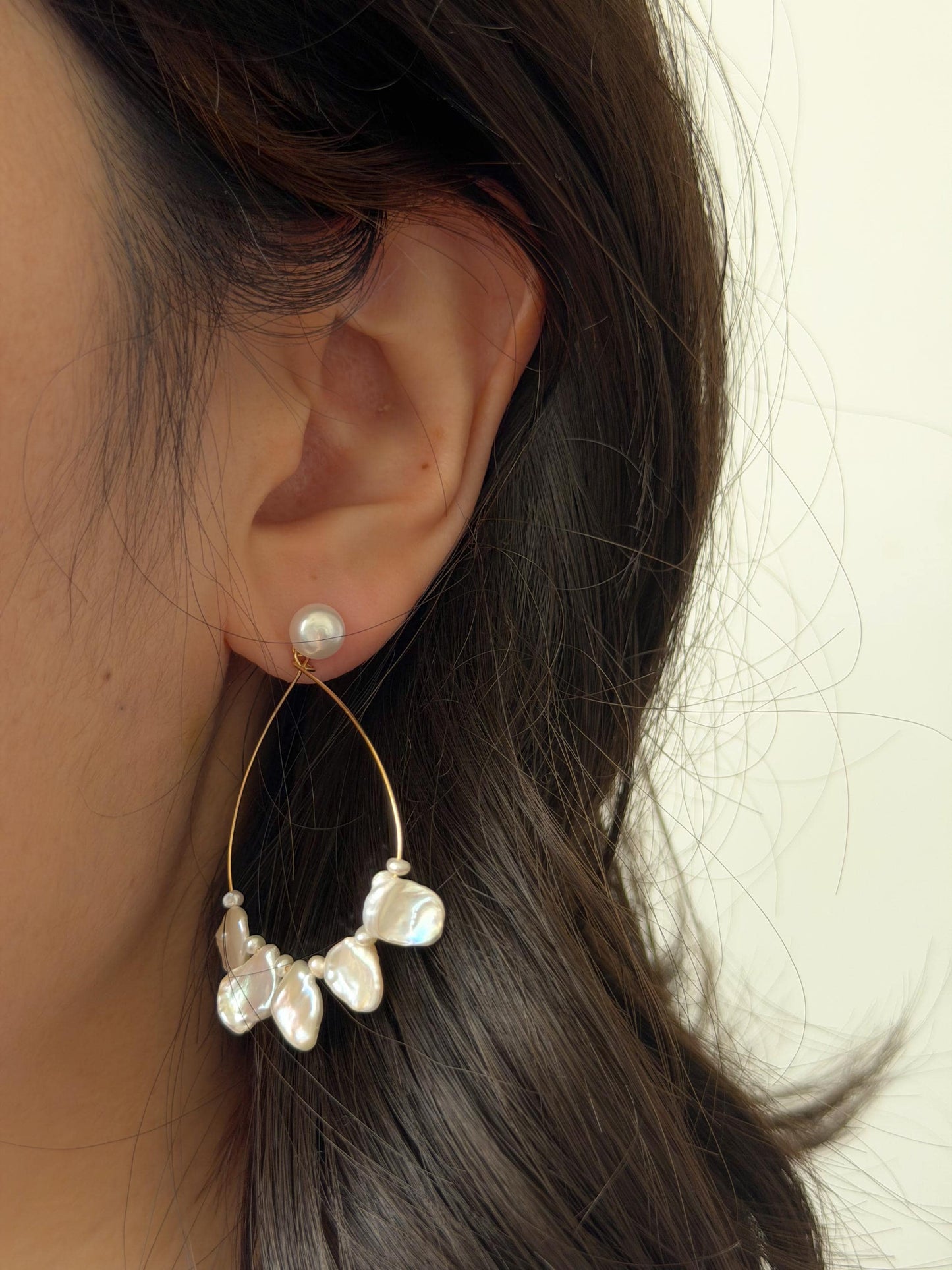 Additional view of statement baroque keshi pearl hoop beach earrings by Le Jardin Perles