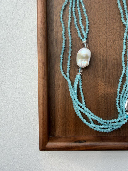 Additional view of layered blue cat eye necklace by Le Jardin Perles
