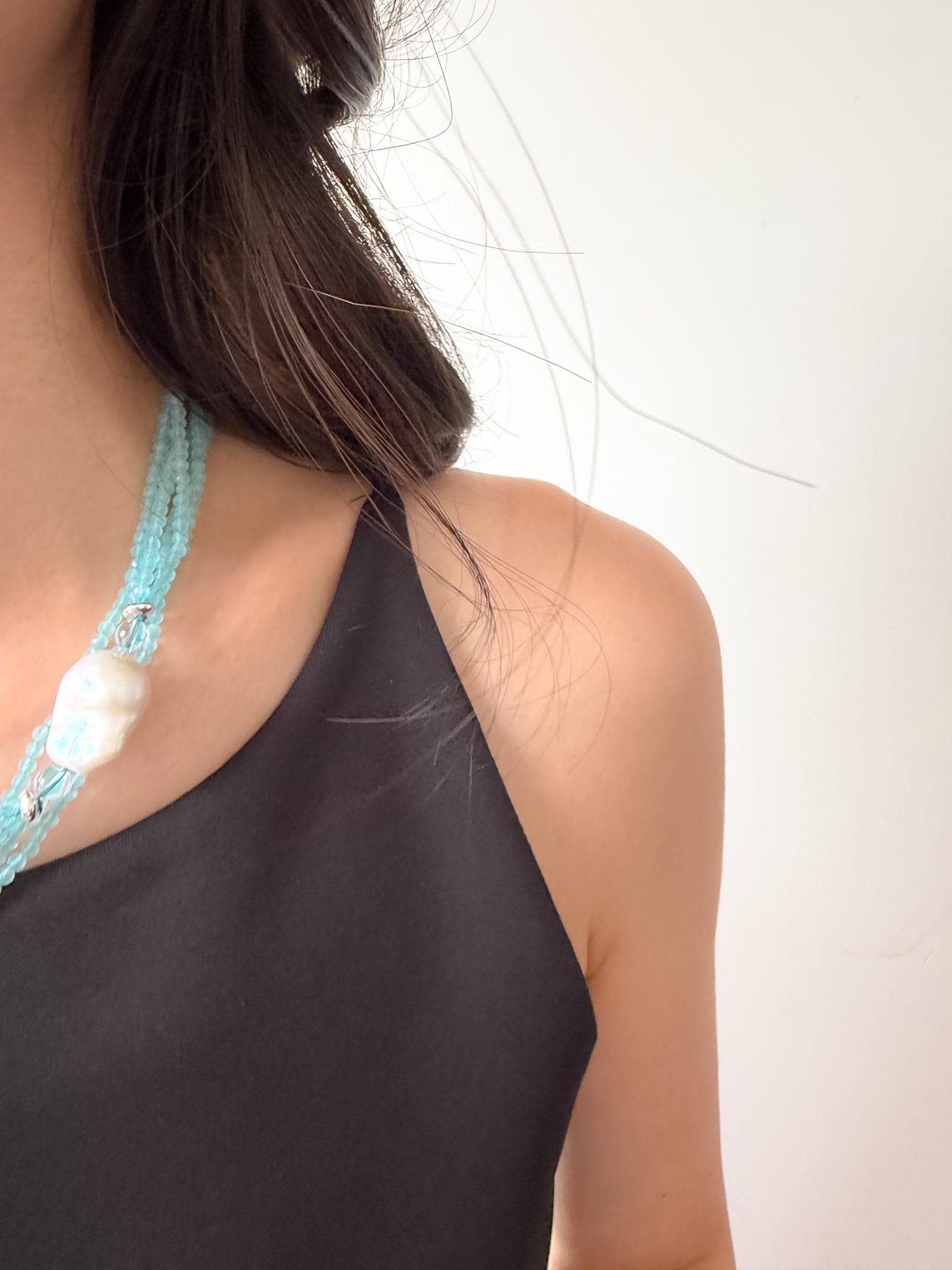 Additional view of layered blue cat eye necklace by Le Jardin Perles