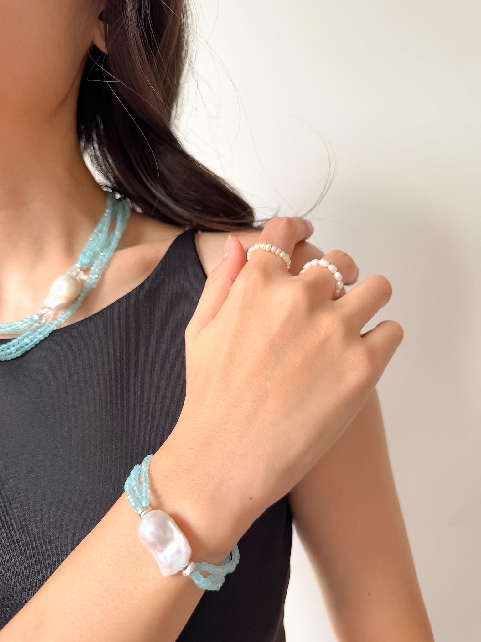Additional view of layered blue cat eye bracelet by Le Jardin Perles