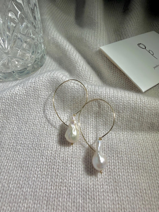 Elongated Baroque Pearl Hoop Earrings by Le Jardin Perles