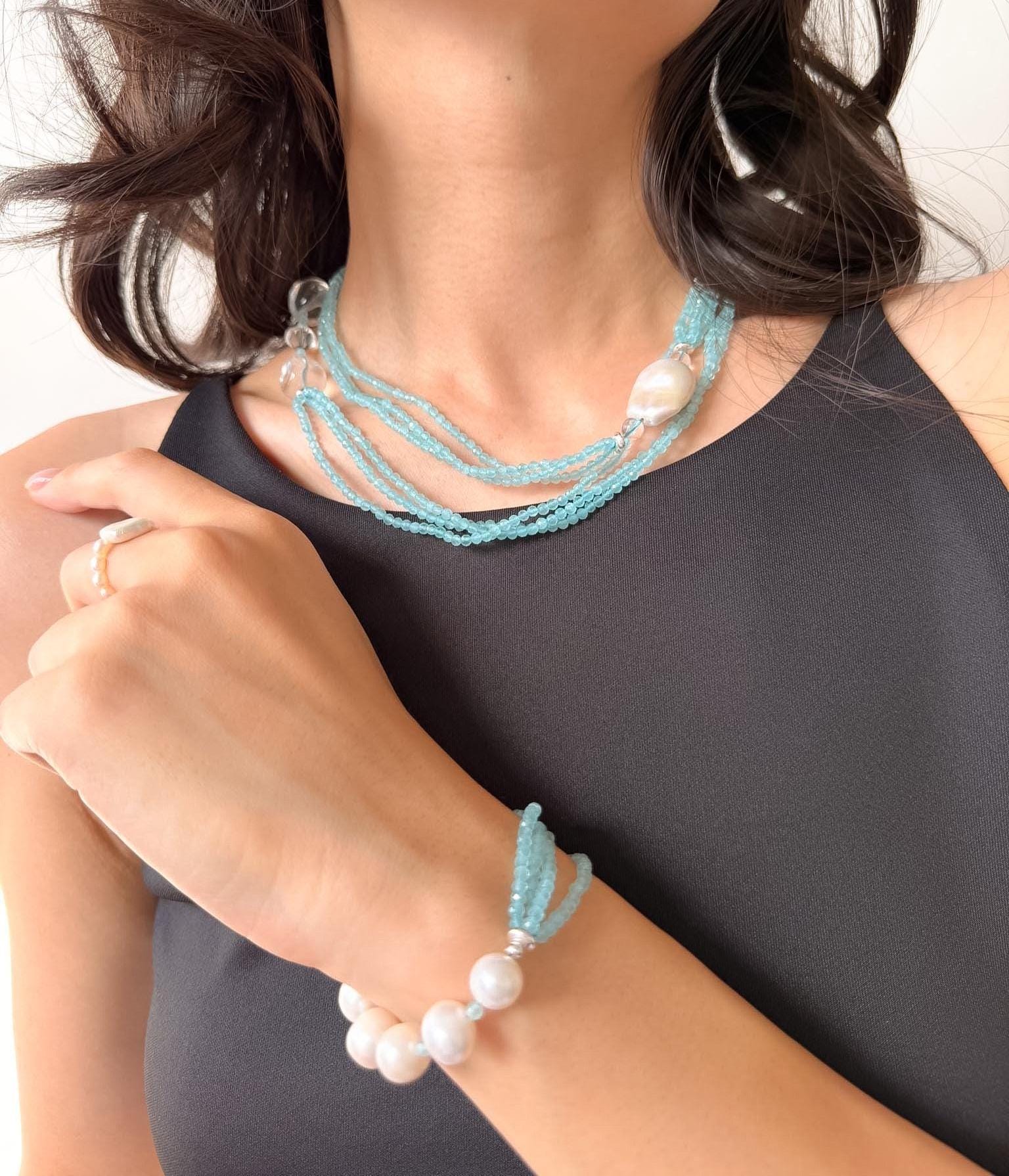Additional view of layered blue cat eye necklace by Le Jardin Perles