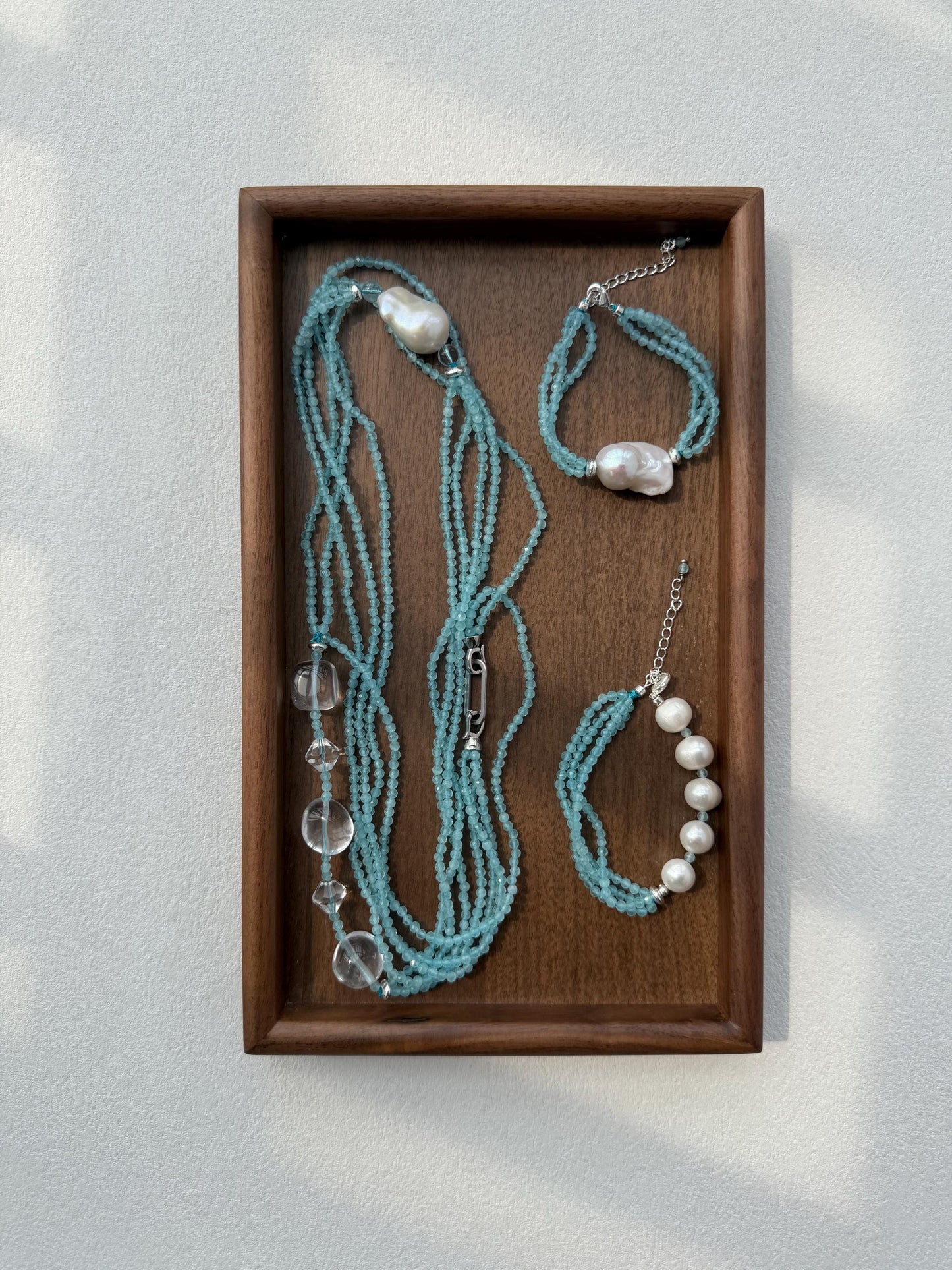 Additional view of layered blue cat eye bracelet by Le Jardin Perles