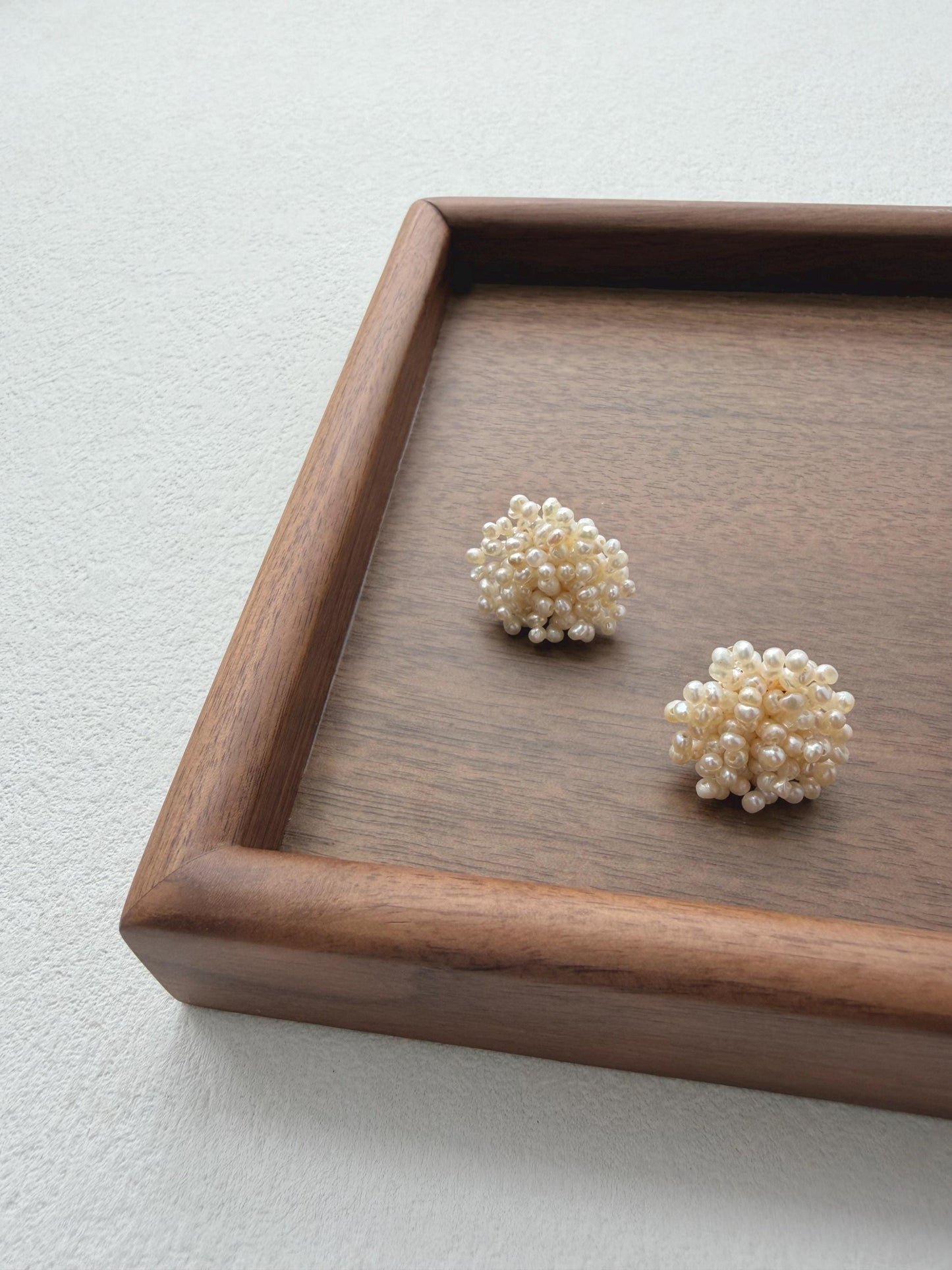 Additional view of handcrafted freshwater pearl flower earrings by Le Jardin Perles
