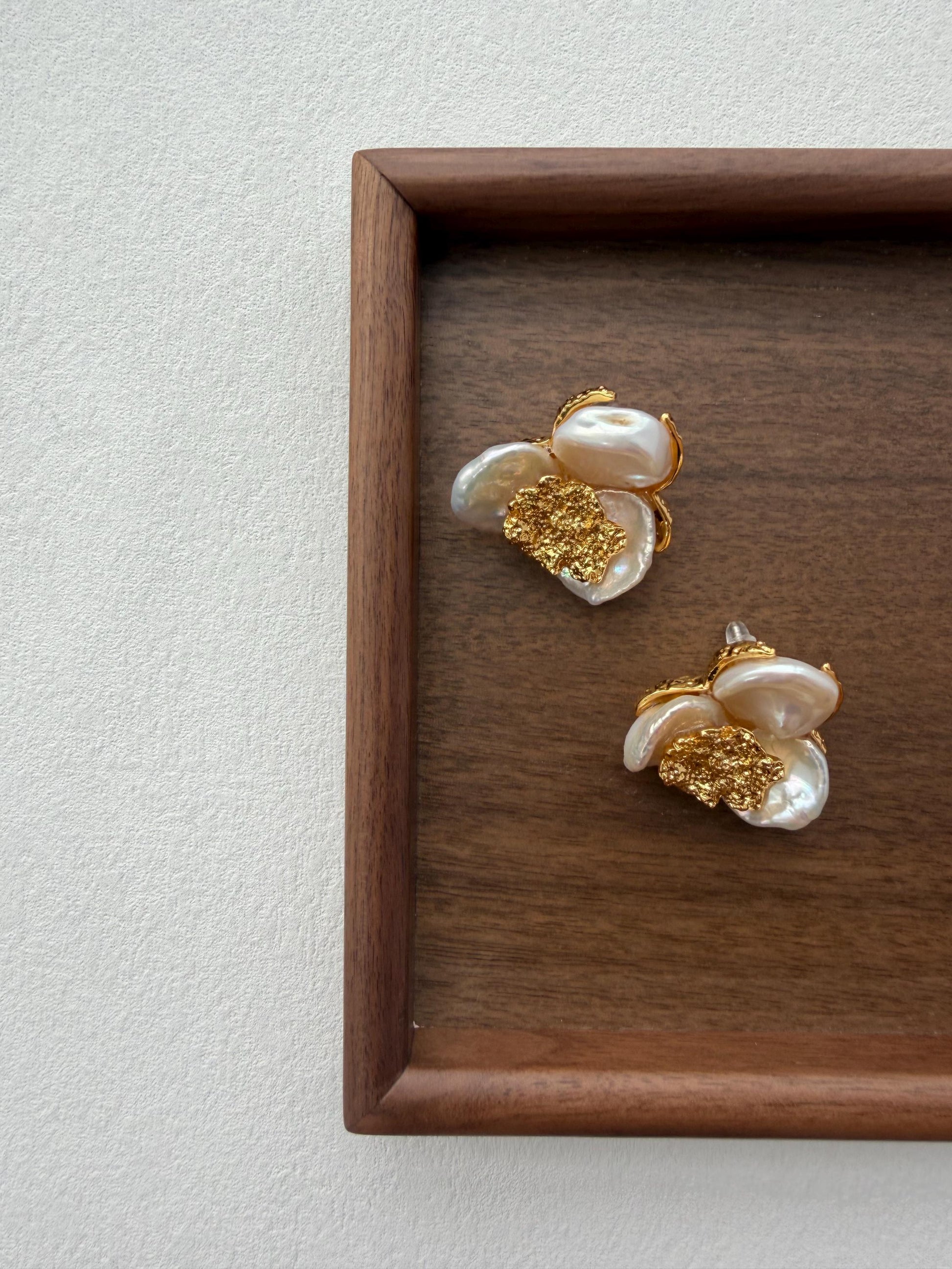 Additional view of 18k gold plated flower pearl statement earrings by Le Jardin Perles