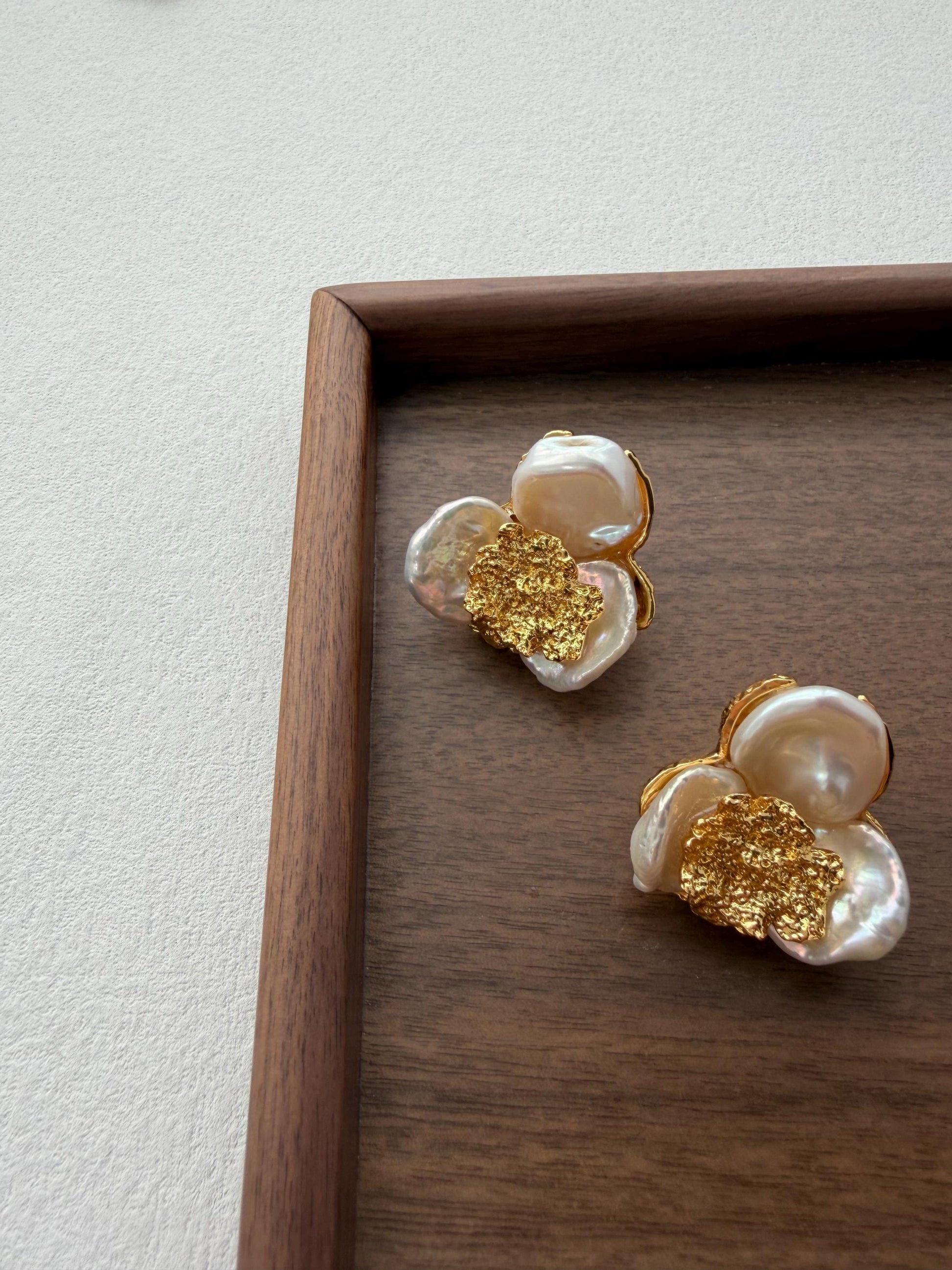 Additional view of 18k gold plated flower pearl statement earrings by Le Jardin Perles