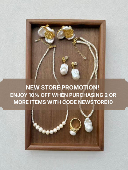 Additional view of wire wrapped baroque pearl drop earrings by Le Jardin Perles