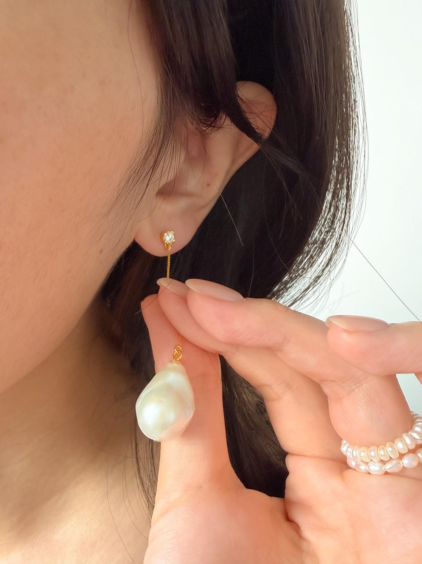 Additional view of baroque pearl drop beach earrings by Le Jardin Perles