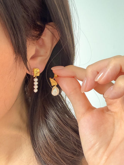 Additional view of asymmetrical baroque pearl drop earrings by Le Jardin Perles
