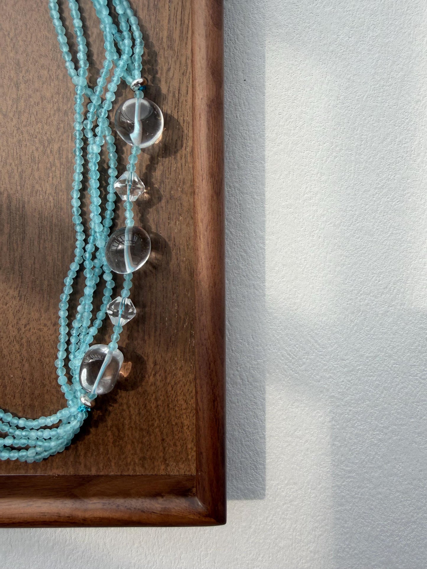 Additional view of layered blue cat eye necklace by Le Jardin Perles