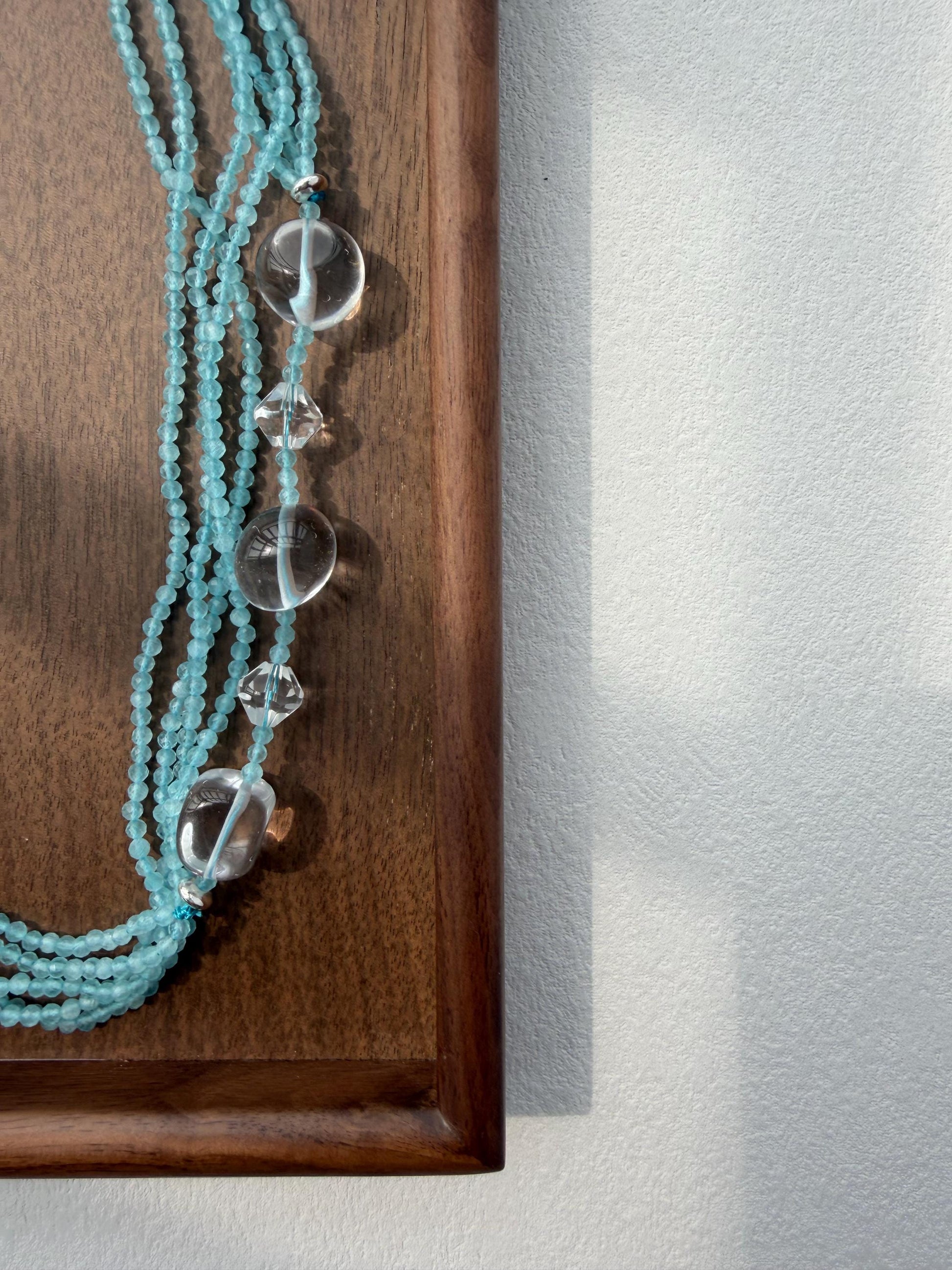 Additional view of layered blue cat eye necklace by Le Jardin Perles