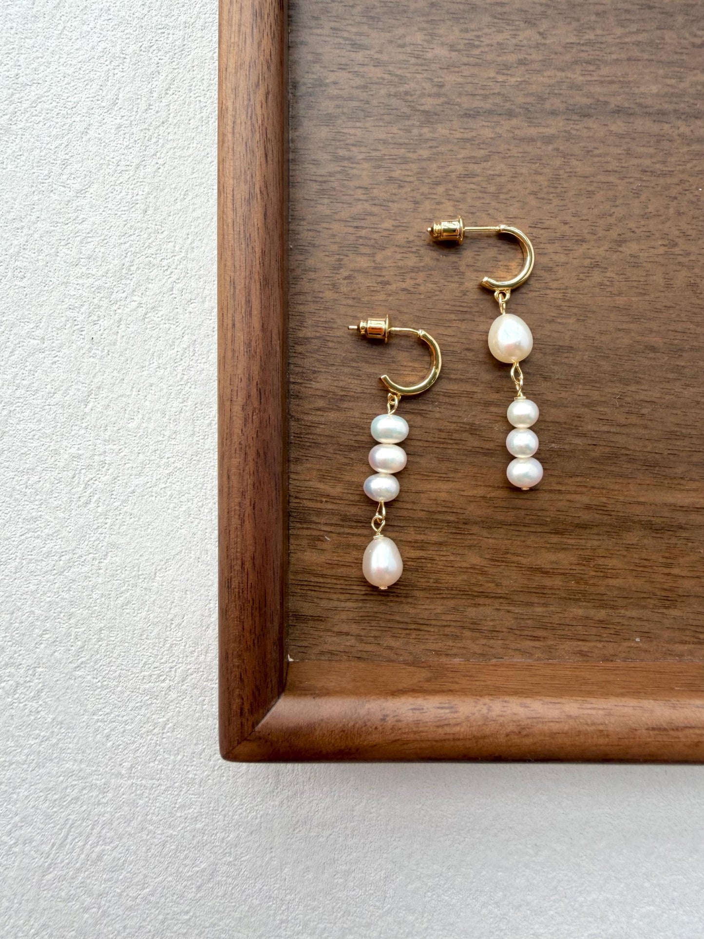 Additional view of asymmetrical baroque pearl drop earrings by Le Jardin Perles