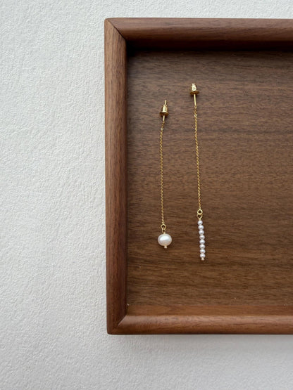 Additional view of asymmetrical freshwater pearl threader earrings by Le Jardin Perles