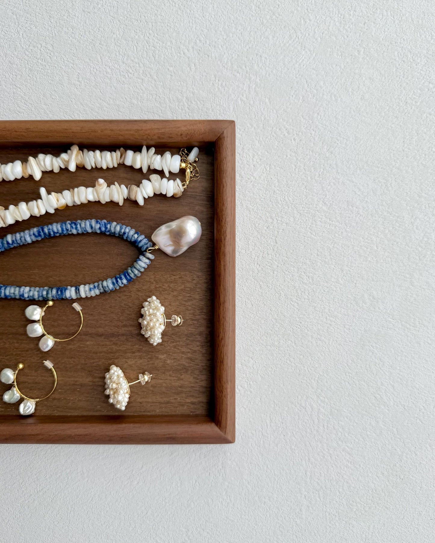 Additional view of handcrafted freshwater pearl flower earrings by Le Jardin Perles