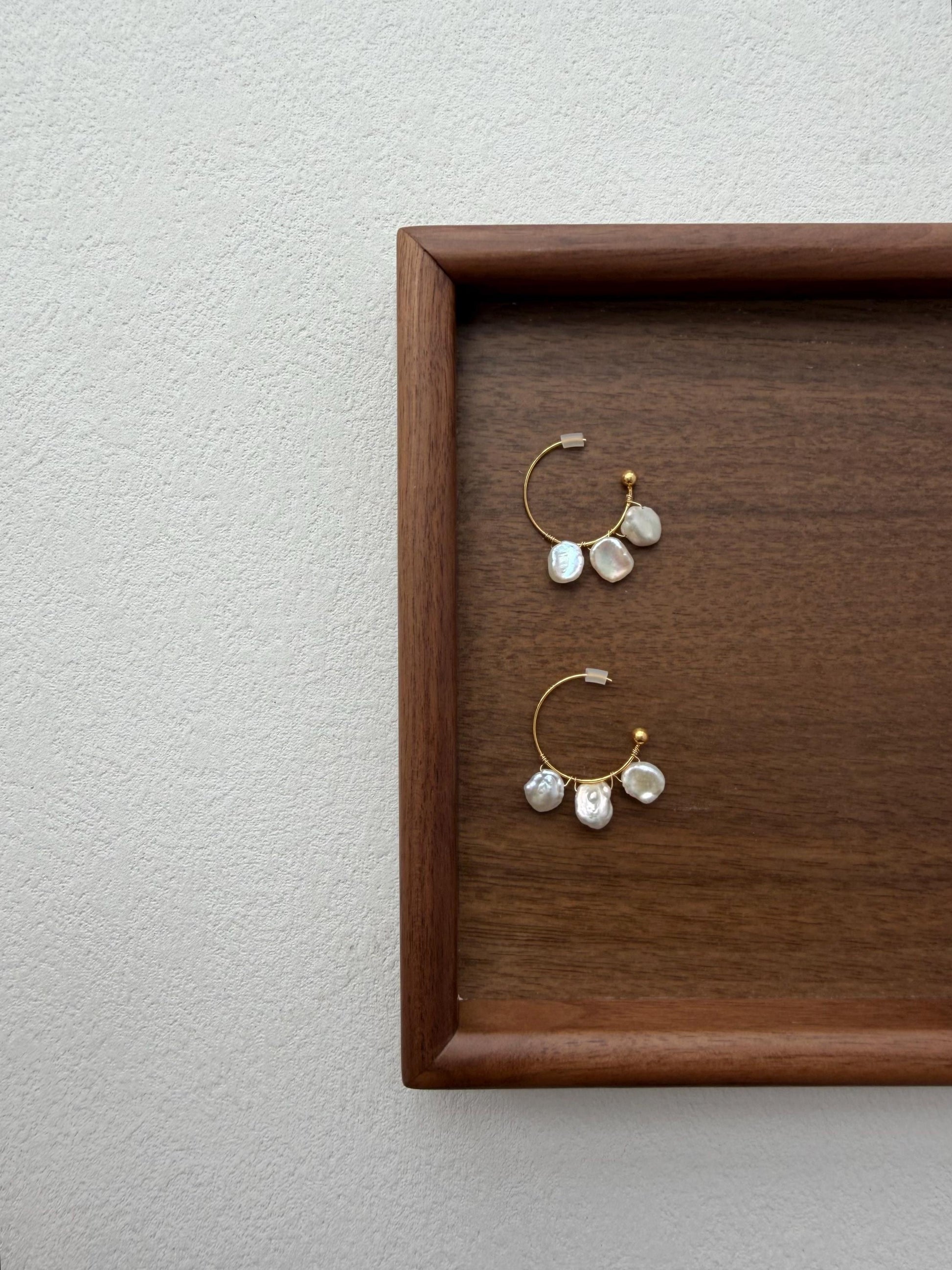Additional view of petal pearl hoop earrings by Le Jardin Perles