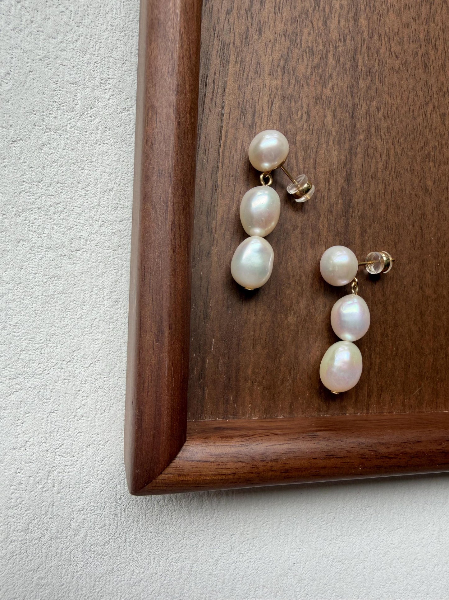 Additional view of triple freshwater pearl drop earrings by Le Jardin Perles