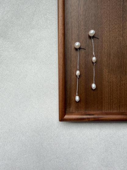 Additional view of french minimalist pearl drop earrings by Le Jardin Perles