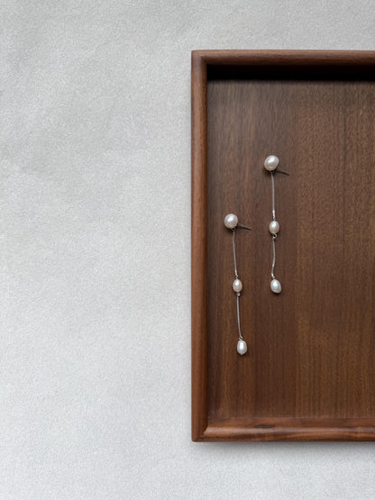 Additional view of french minimalist pearl drop earrings by Le Jardin Perles