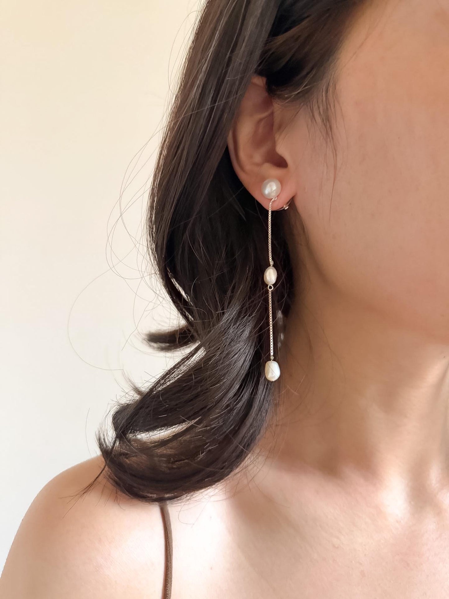 Additional view of french minimalist pearl drop earrings by Le Jardin Perles