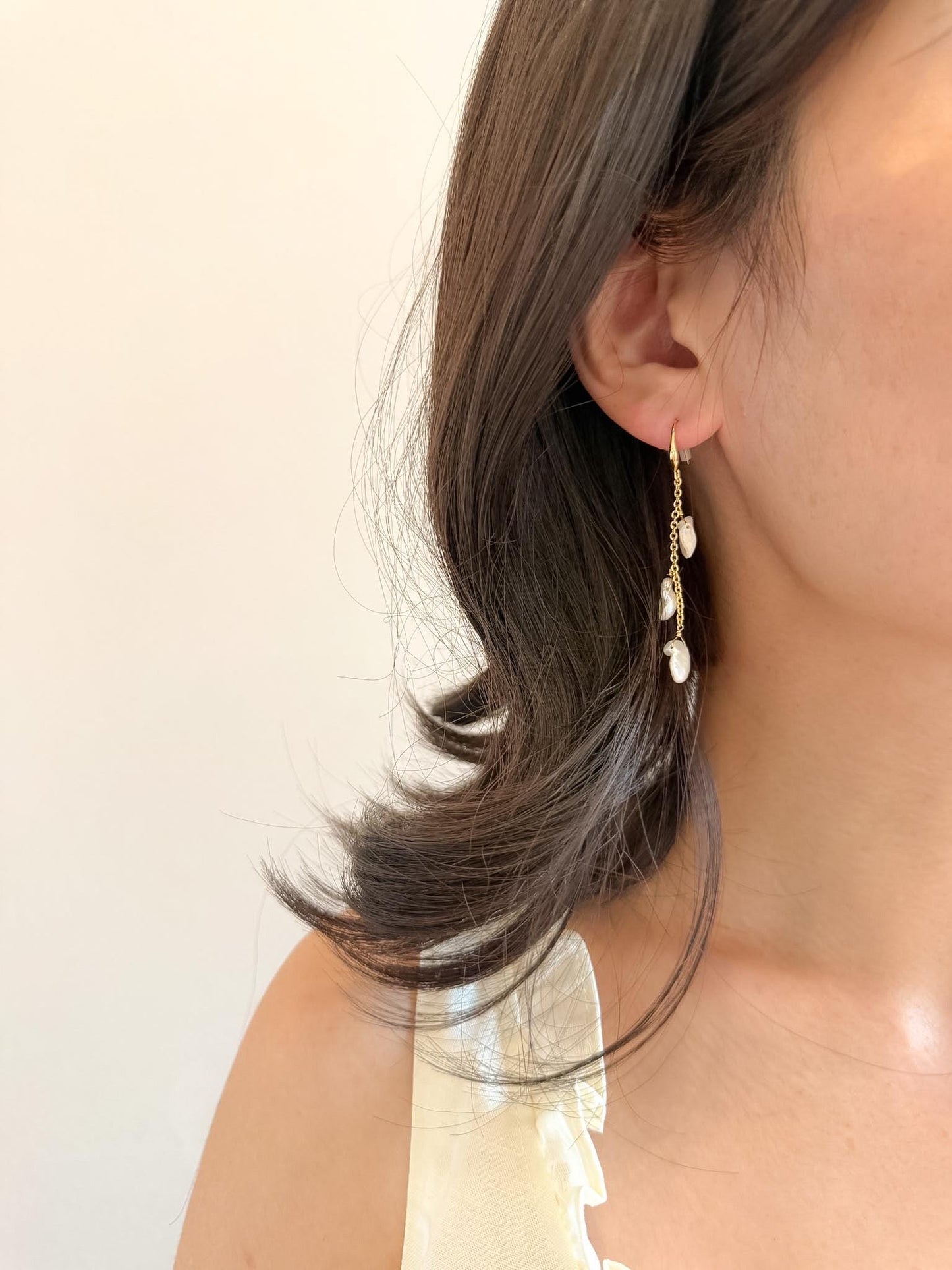 Additional view of petal pearl dangle earrings by Le Jardin Perles